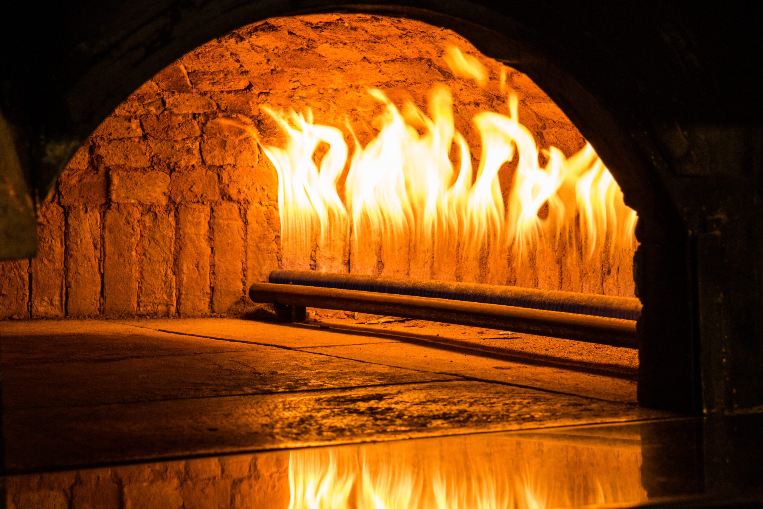 Flames,In,The,Brick,Oven,Which,Is,Working,With,Natural