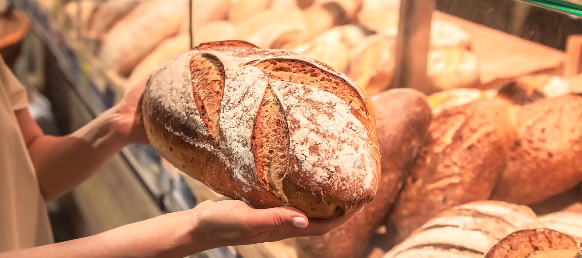 loaf-bread-female-hands-supermarket